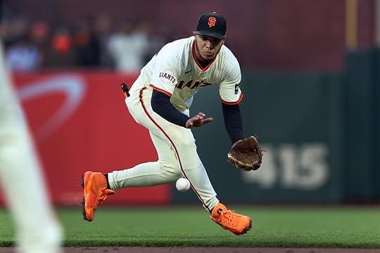 San Francisco Giants’ LaMonte Wade Jr. (31) fields a ground...