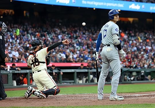 Los Angeles Dodgers’ Shohei Ohtani (17) reacts after his second...