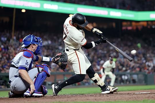 San Francisco Giants’ Curt Casali (18) connects an RBI double...