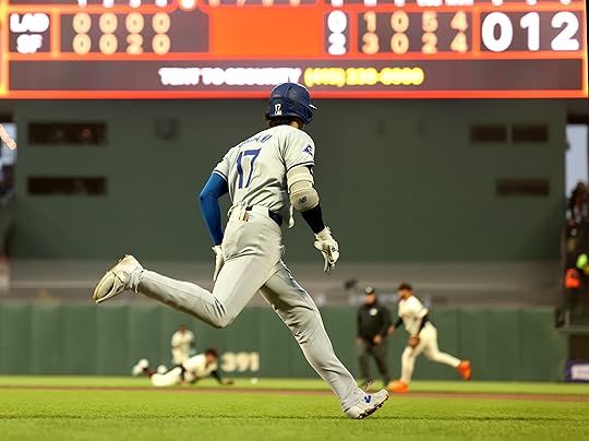 Los Angeles Dodgers’ Shohei Ohtani (17) heads to first after...