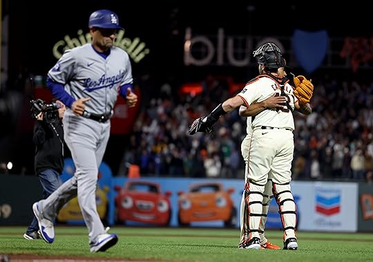 San Francisco Giants closer Camilo Doval (75) n and catcher...