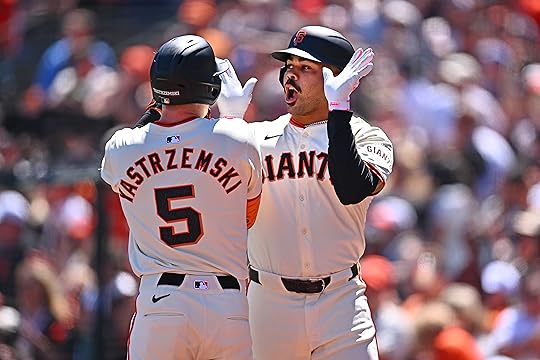 San Francisco Giants’ LaMonte Wade Jr. (31) gestures to teammate...