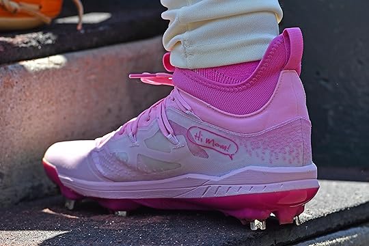 San Francisco Giants’ Jung Hoo Lee (51) wears pink baseball...