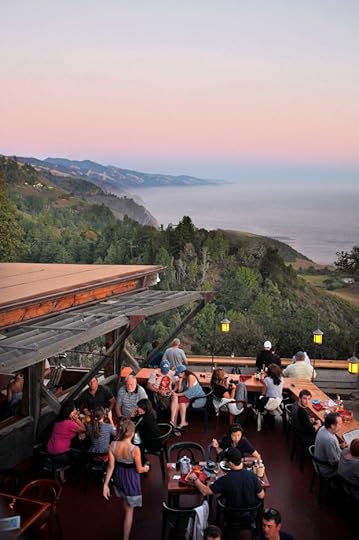 Visitors enjoy the view looking south from the back deck of Nepenthe Restaurant in Big Sur, Calif. at sunset. (Photo David Royal -- Monterey County Herald file)