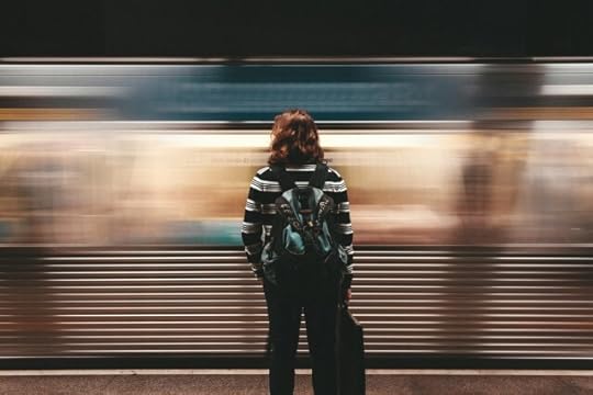 person watching a train go by. be here now and mindfulness in motion