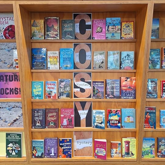 Library display of cosy mystery books
