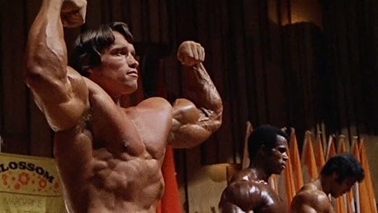 Arnold Schwarzenegger flexes in