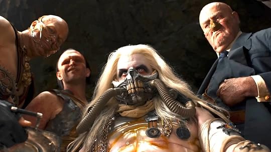Immortan Joe high atop the Citadel surrounded by his sons and allies in Furiosa