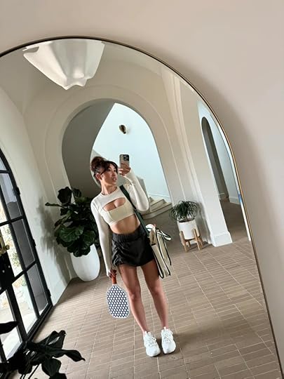 cassey ho blogilates wearing popflex bungee superskort with corset bra and shrug pickleball outfit