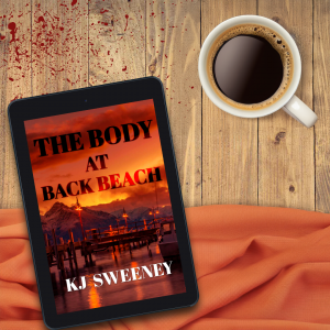 The Body at Back Beach a New Zealand Murder Mystery, shown on an e-reader with a cup of black coffee next to it lying on an orange piece of cloth at the bottom and blood splatters on the boards on which it sits. Perhaps there was really a murder here.