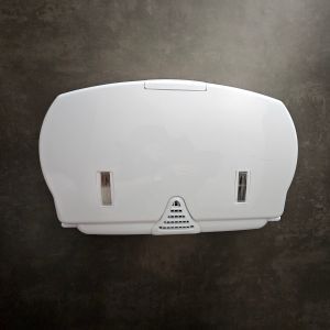 Picture of a loo roll dispenser that looks like a fat faced duck