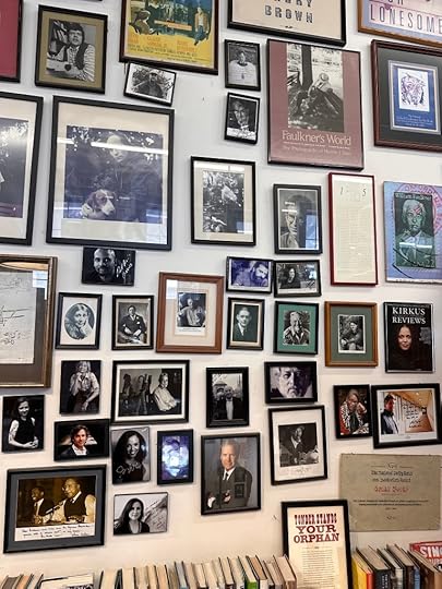 Framed photos on the wall at Square Books