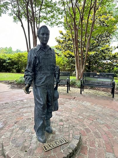 Statue of Elvis at 13