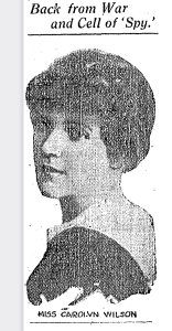 newspapeer clipping with a picture of Wilson looking over her shoulder and the caption