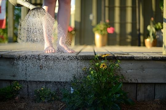 Voskamp children watering flowers