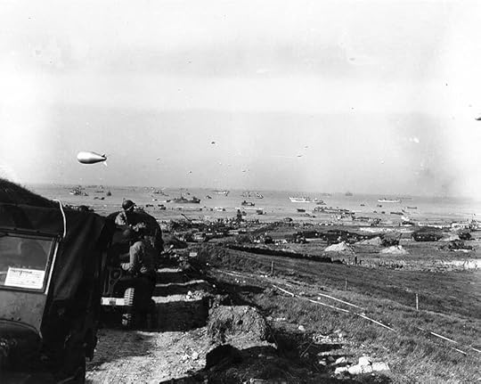 US troops and equipment being landed near Colleville-sur-Mer, France, 9 Jun 1944 (US National Archives: SC 190058)