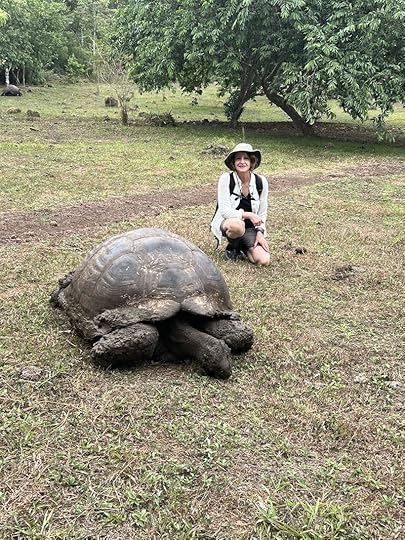 Dr. Rivera next to a tortoise