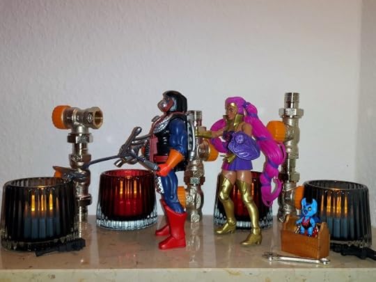 Entrapta gives Dragstor a tune-up, while Imp looks on, sitting on her tool box