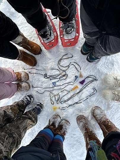 mala beads on snow