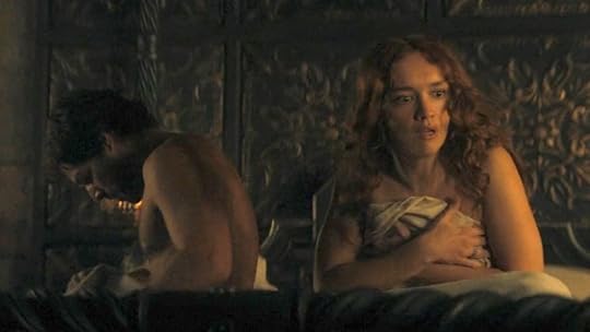 A naked Criston Cole starts to dress while a shocked Alicent covers up with the blanket on House of the Dragon