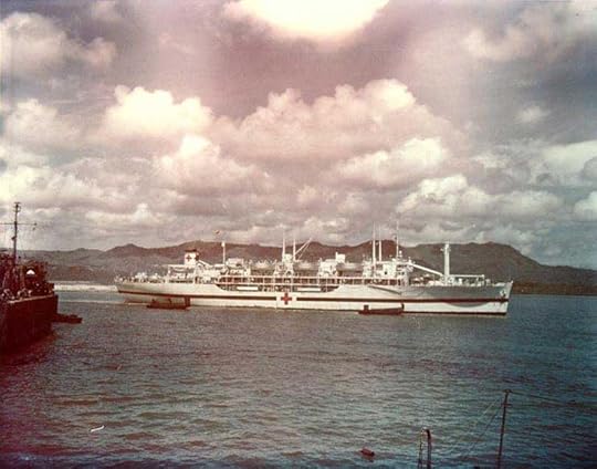 Hospital ship USS Tranquility arriving at Guam with survivors of sinking of USS Indianapolis, 8 Aug 1945. (US National Archives: 80-G-K-5979)