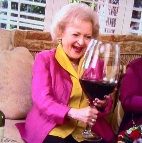Betty White holding a comically large wine glass