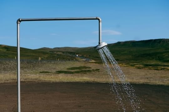 a sprinkle of water is coming out of a pipe