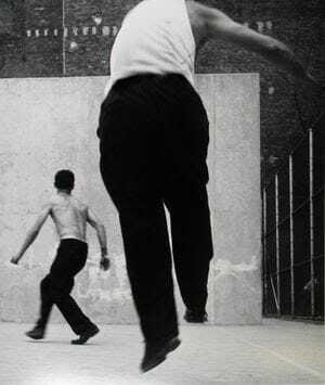 Leon Levinstein, Handball Players, Houston Street, New York, 1955. Gelatin silver print; printed later. Image size: 18 1/8 x 15 5/8 inches; Paper size: 20 x 16 inches. © Estate of Leon Levinstein, Courtesy of Howard Greenberg Gallery, New York