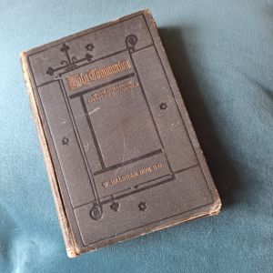 Photo of cover of Grandpa's communion prayer book