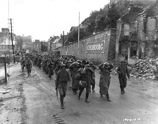 US infantry captain with German prisoners in Cherbourg, France, June 1944 (US National Archives: SC 190810)