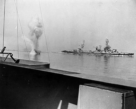 German coast artillery shell falling between battleships USS Texas (background) and USS Arkansas (foreground) off Cherbourg, France, 25 June 1944 (US National Archives: 80-G-244210)