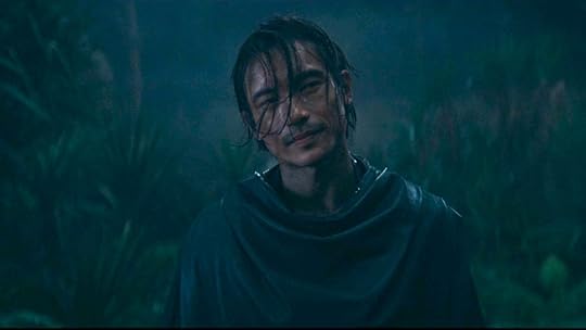 Manny Jacinto as Qimir on The Acolyte looking smug