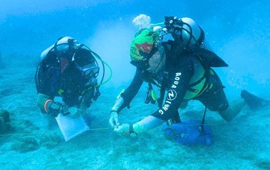The backpacking husband on a dive project off Utila Honduras