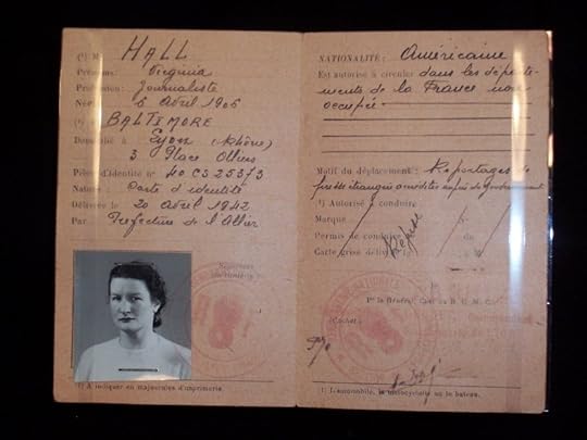 French identification document or travel permit containing a photograph of a woman. The document is titled 