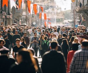 street scene showing a crowd of people. 