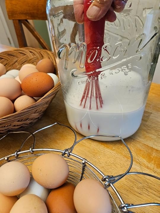 Mixing pickling lime into water to make water glassed eggs