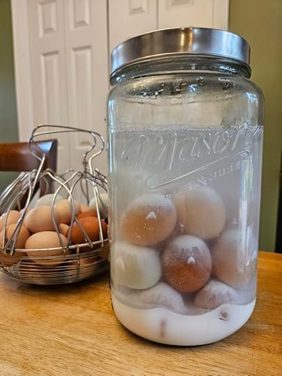 Water glassed eggs in a large mason jar