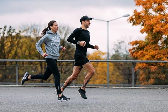 The author and his wife running in the Olympic Park, Munich