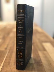 Teen reading about America