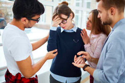 friends comforting woman