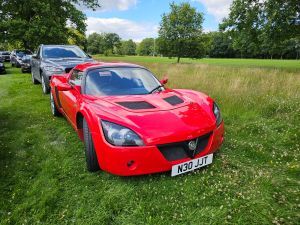 Picture of a red Vauxhall VX220