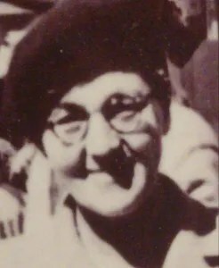 headshot of Grandma in a beret