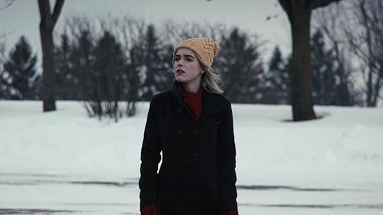 kiernan shipka stands in the snow in oz perkins movie blackcoats daughter