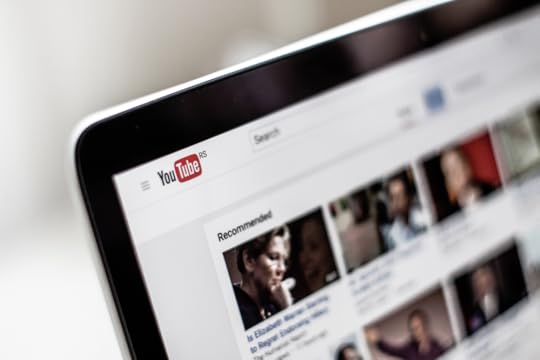 Laptop screen with a YouTube menu