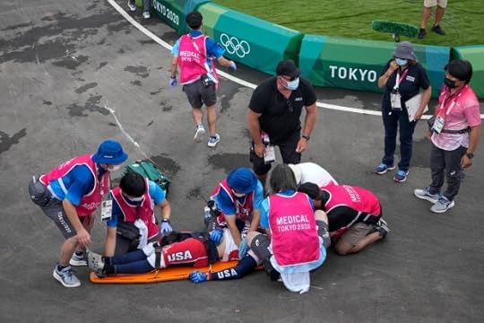 FILE - Medics prepare to carry Connor Fields, of the United States, away on a stretcher after he crashed in the men's BMX Racing semifinals at the 2020 Summer Olympics, Friday, July 30, 2021, in Tokyo, Japan. His injuries were numerous: torn shoulder ligaments, a torn bicep, broken ribs, a collapsed lung. But most serious was what was diagnosed as a subarachnoid hemorrhage and subdural hematoma essentially, bleeding on the brain. (AP Photo/Ben Curtis, File)
