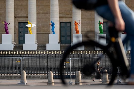 Copies of one of the most famous Greek statues, the Venus of Milo, stand on the steps of the French National Assembly ahead of the 2024 Summer Olympics, Friday, July 19, 2024, in Paris, France. The Venus, by artist Laurent Perbos, has regained her arms and is now equipped with the attributes of six sporting disciplines. (AP Photo/David Goldman)