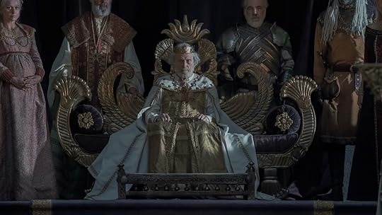 King Jaehaerys on a throne surrounded by his family and guards on House of the Dragon, this is the father of Saera Targaryen