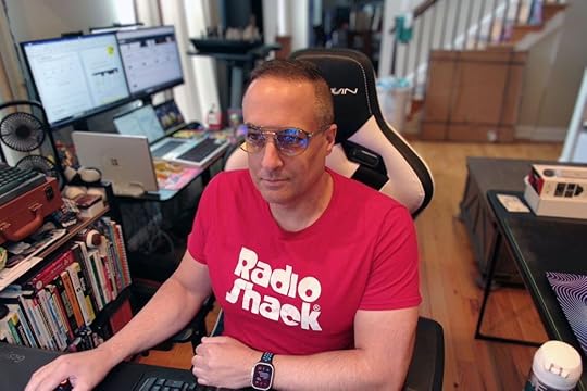 Man wearing Gunnar World of Warcraft, Alliance Edition glasses in front of a computer