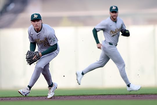 Oakland Athletics’ Zack Gelof (20) fields a grounder to throw...