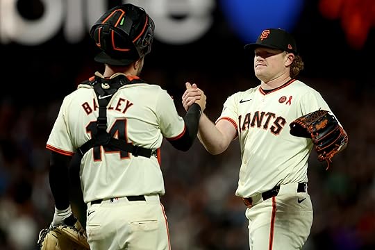 San Francisco Giants starting pitcher Logan Webb (62) and San...